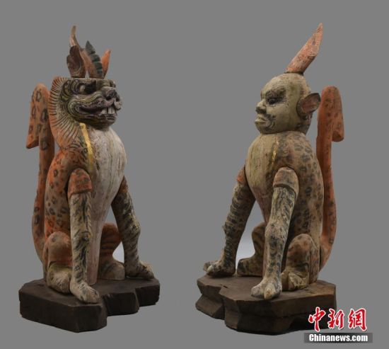 圖為慕容智墓出土鎮(zhèn)墓獸。 中新社發(fā) 甘肅省文物局 供圖